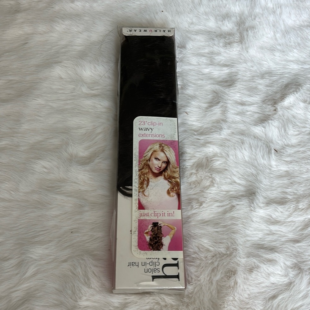 Jessica Simpson clip-in wavy hair extensions.